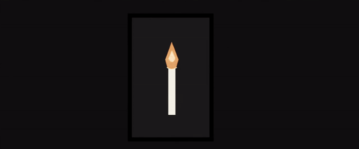 A single candle flickering in the darkness